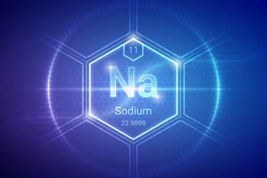 Symbol Na, pierwiastek sód, atomowa liczba 11, masa atomowa 22.9898, na tle niebieskich heksagonów i kręgów.